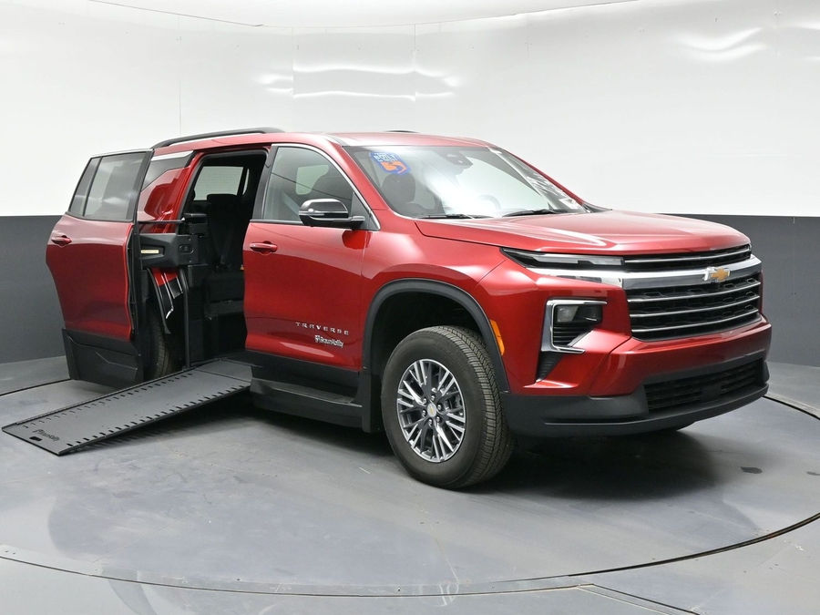 Red Chevrolet Traverse with BraunAbility Side Entry Automatic In Floor conversion