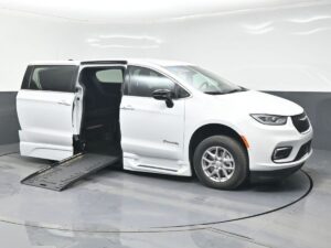 White Chrysler Pacifica with BraunAbility Side Entry Automatic Fold Out conversion