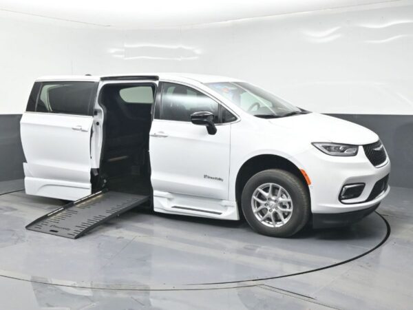 White Chrysler Pacifica with BraunAbility Side Entry Automatic Fold Out conversion