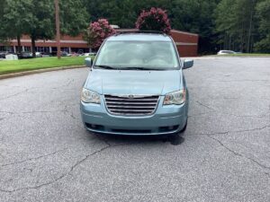 Blue Chrysler Town and Country with Freedom Motors Rear Entry Manual Fold Out conversion