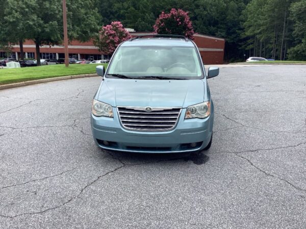 Blue Chrysler Town and Country with Freedom Motors Rear Entry Manual Fold Out conversion