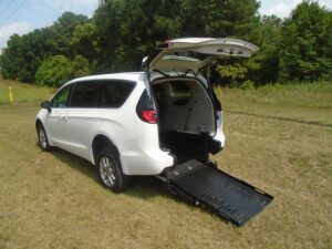 White Chrysler Pacifica with FR Conversions Rear Entry Manual Fold Out conversion