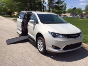 White Chrysler Pacifica with Vantage Mobility Side Entry Automatic In Floor conversion