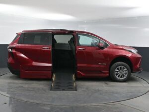 Red Toyota Sienna with BraunAbility Side Entry Automatic Fold Out conversion