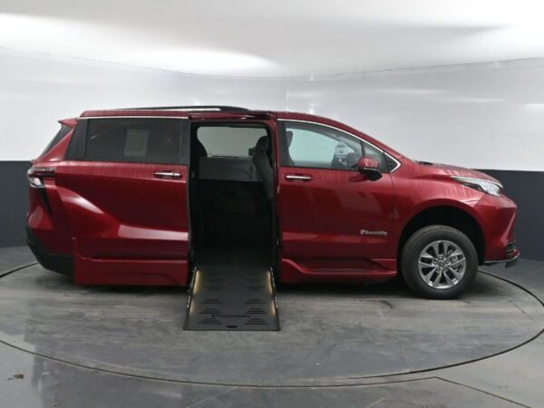 Red Toyota Sienna with BraunAbility Side Entry Automatic Fold Out conversion