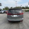 Blue Chrysler Pacifica with BraunAbility Side Entry Automatic Fold Out conversion