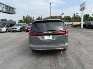 Blue Chrysler Pacifica with BraunAbility Side Entry Automatic Fold Out conversion