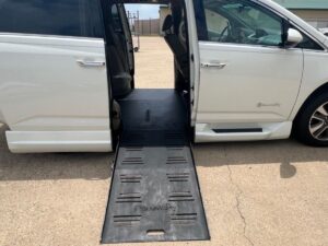 White Honda Odyssey with BraunAbility Side Entry Automatic Fold Out conversion