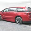 Red Honda Odyssey with BraunAbility Side Entry Automatic In Floor conversion