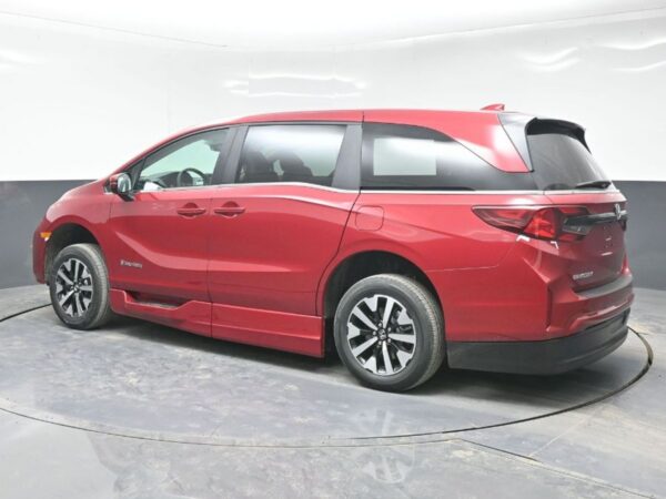Red Honda Odyssey with BraunAbility Side Entry Automatic In Floor conversion
