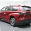 Red Toyota Sienna with BraunAbility Side Entry Automatic Fold Out conversion