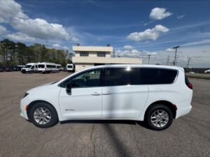 White Chrysler Voyager with Driverge Rear Entry Manual Fold Out conversion