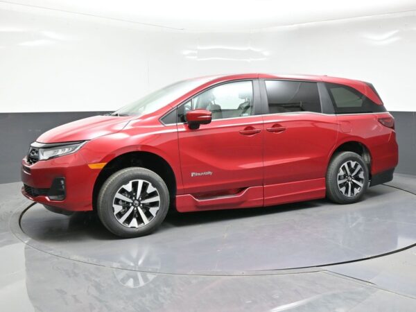 Red Honda Odyssey with BraunAbility Side Entry Automatic In Floor conversion