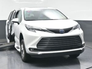 White Toyota Sienna with BraunAbility Side Entry Automatic Fold Out conversion