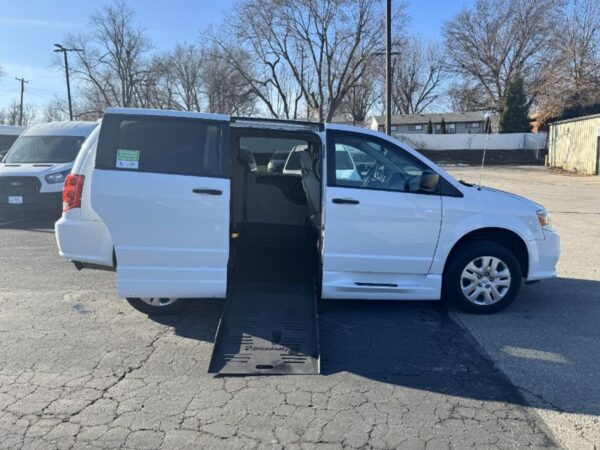 White Dodge Grand Caravan with BraunAbility Side Entry Manual Fold Out conversion