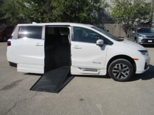 White Honda Odyssey with BraunAbility Side Entry Automatic In Floor conversion