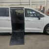 White Chrysler Voyager with Driverge Side Entry Automatic Fold Out conversion