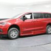 Red Chrysler Pacifica with BraunAbility Side Entry Automatic Fold Out conversion