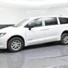 White Chrysler Voyager with BraunAbility Rear Entry Manual Fold Out conversion