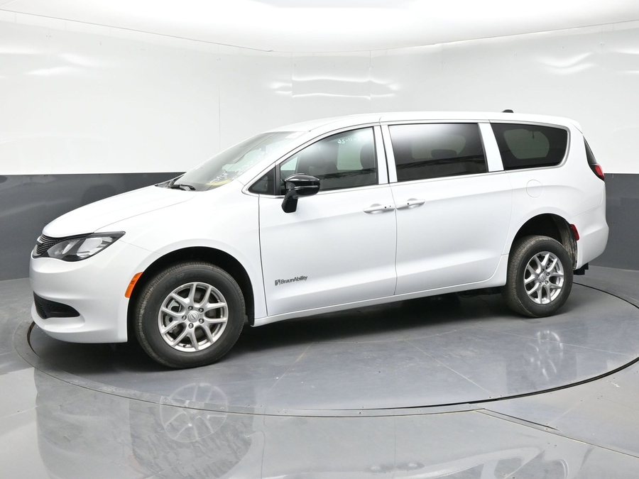 White Chrysler Voyager with BraunAbility Rear Entry Manual Fold Out conversion