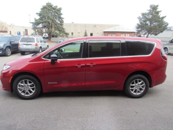 Red Chrysler Pacifica with Driverge Side Entry Automatic Fold Out conversion