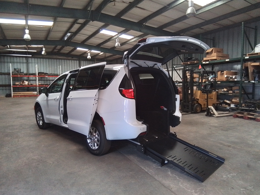 White Chrysler Pacifica with FR Conversions Rear Entry Manual Fold Out conversion