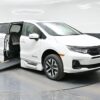 White Honda Odyssey with BraunAbility Side Entry Automatic In Floor conversion