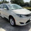 White Chrysler Pacifica with Vantage Mobility Side Entry Automatic In Floor conversion