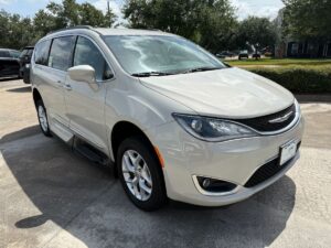 White Chrysler Pacifica with Vantage Mobility Side Entry Automatic In Floor conversion