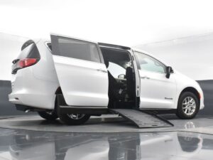 White Chrysler Voyager with BraunAbility Side Entry Manual Fold Out conversion