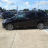 Black Toyota Sienna with Driverge Rear Entry Manual Fold Out conversion