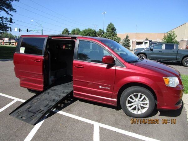Red Dodge Grand Caravan with BraunAbility Side Entry Manual Fold Out conversion
