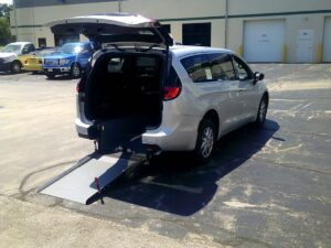 Silver Chrysler Pacifica with Driverge Rear Entry Manual Fold Out conversion