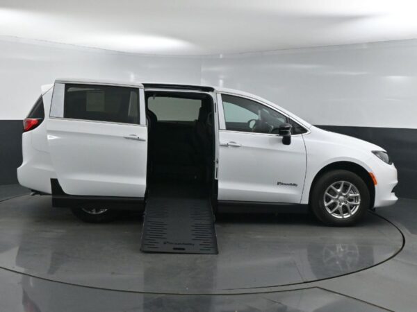White Chrysler Voyager with BraunAbility Side Entry Manual Fold Out conversion