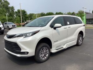 White Toyota Sienna with BraunAbility Side Entry Automatic Fold Out conversion