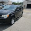 Black Dodge Grand Caravan with BraunAbility Side Entry Automatic Fold Out conversion