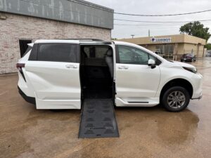 White Toyota Sienna with BraunAbility Side Entry Automatic Fold Out conversion
