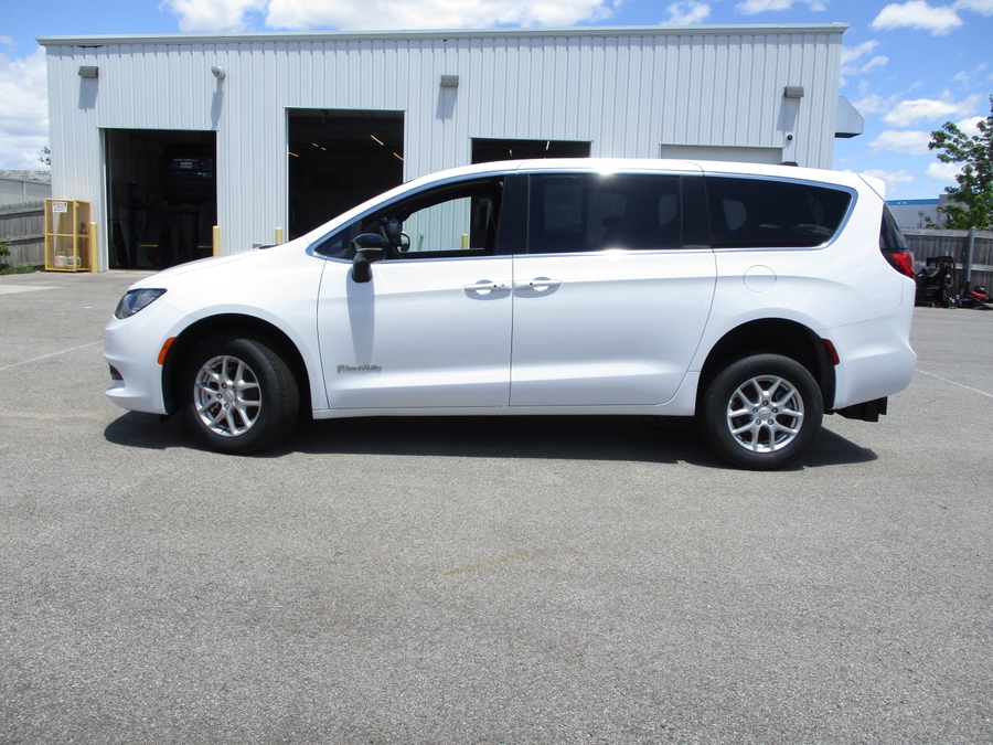 White Chrysler Voyager with BraunAbility Rear Entry Manual Fold Out conversion
