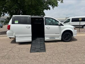White Dodge Grand Caravan with BraunAbility Side Entry Automatic Fold Out conversion