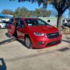 Red Chrysler Pacifica with Driverge Side Entry Automatic Fold Out conversion
