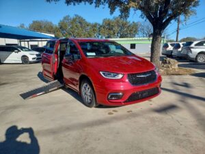 Red Chrysler Pacifica with Driverge Side Entry Automatic Fold Out conversion