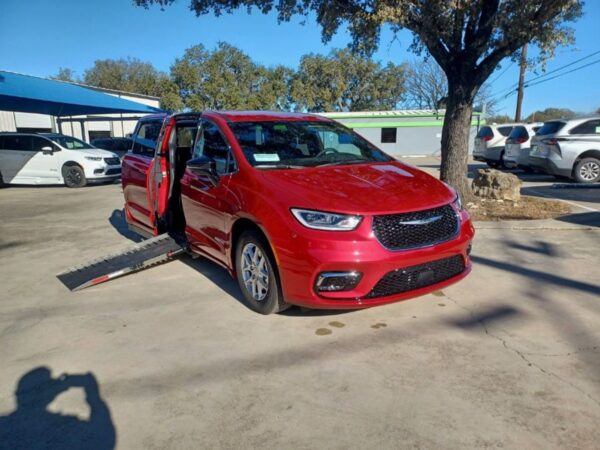 Red Chrysler Pacifica with Driverge Side Entry Automatic Fold Out conversion