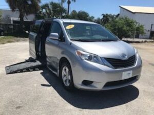 Silver Toyota Sienna with BraunAbility Side Entry Automatic Fold Out conversion