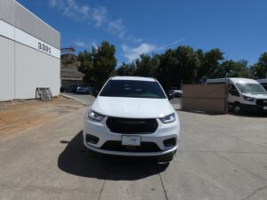 White Chrysler Pacifica with BraunAbility Side Entry Automatic In Floor conversion