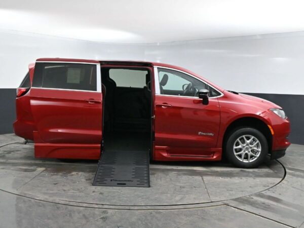 Red Chrysler Voyager with BraunAbility Side Entry Automatic Fold Out conversion