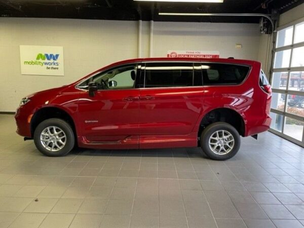 Red Chrysler Pacifica with Driverge Side Entry Automatic Fold Out conversion