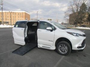 White Toyota Sienna with BraunAbility Side Entry Automatic Fold Out conversion