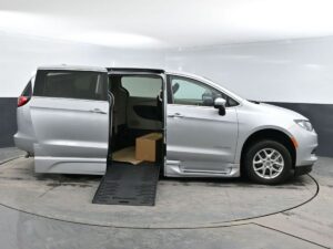 Silver Chrysler Voyager with BraunAbility Side Entry Automatic Fold Out conversion