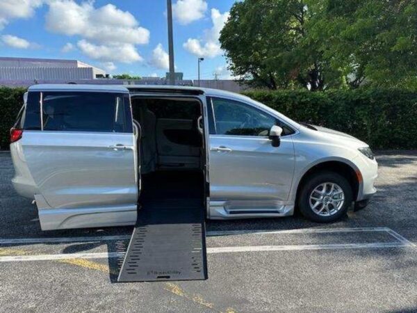 Silver Chrysler Voyager with BraunAbility Side Entry Automatic In Floor conversion