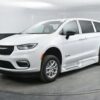 White Chrysler Pacifica with BraunAbility Side Entry Automatic Fold Out conversion